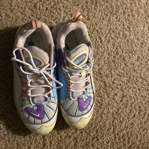 Size 8.5 they are Nike they in a good condition the shoes have multiple color